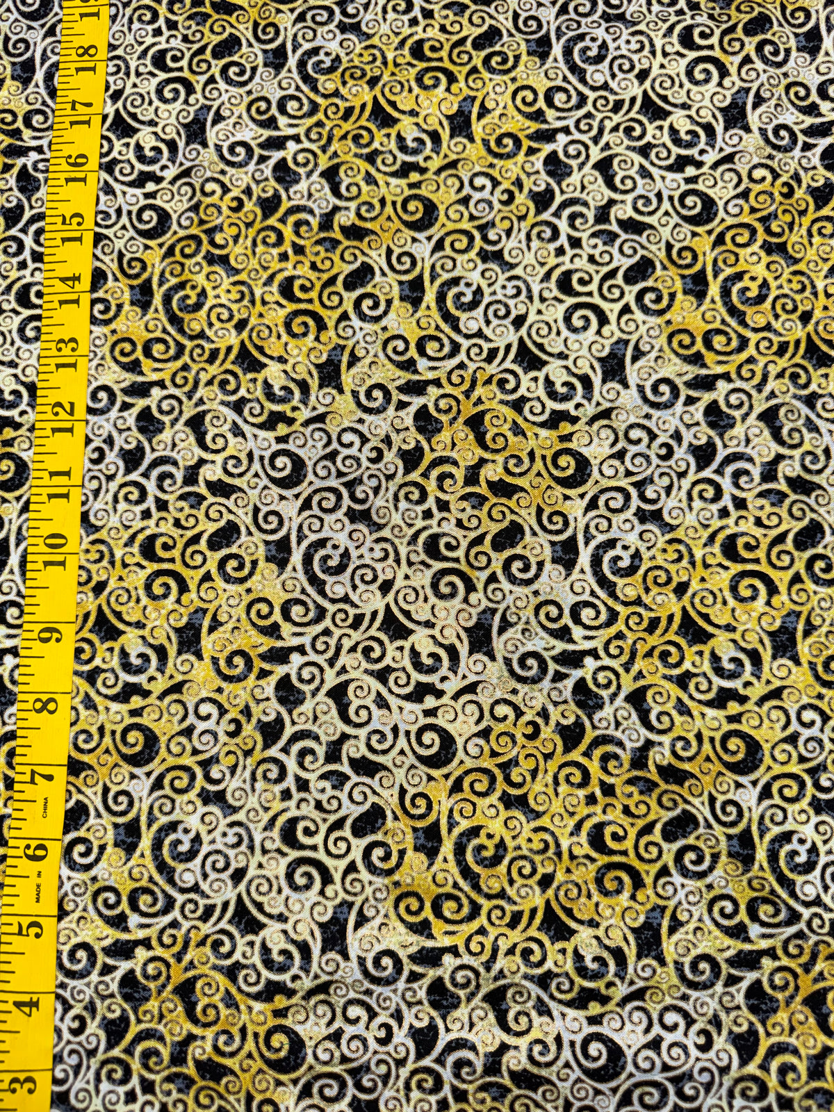 Mystique - Gold Curlies on Black