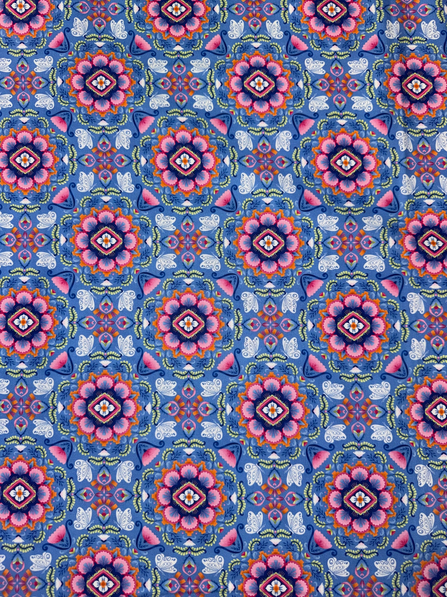 Flutter -Stylised Butterfly Medallions in blues and pinks