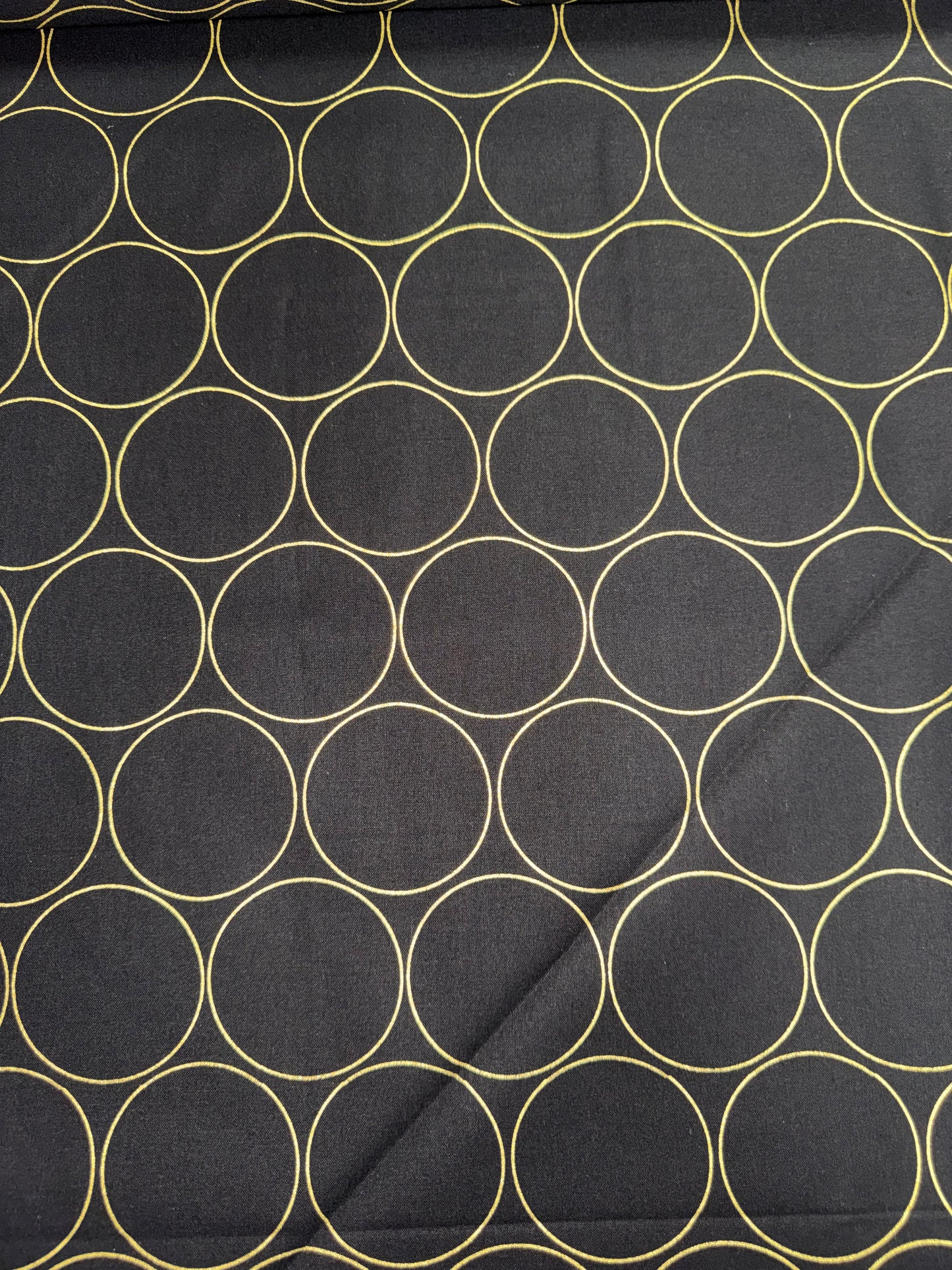Gold Circles on a black background