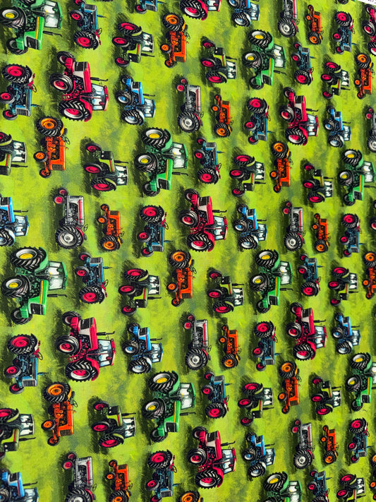 Tractors on a Green Field Background