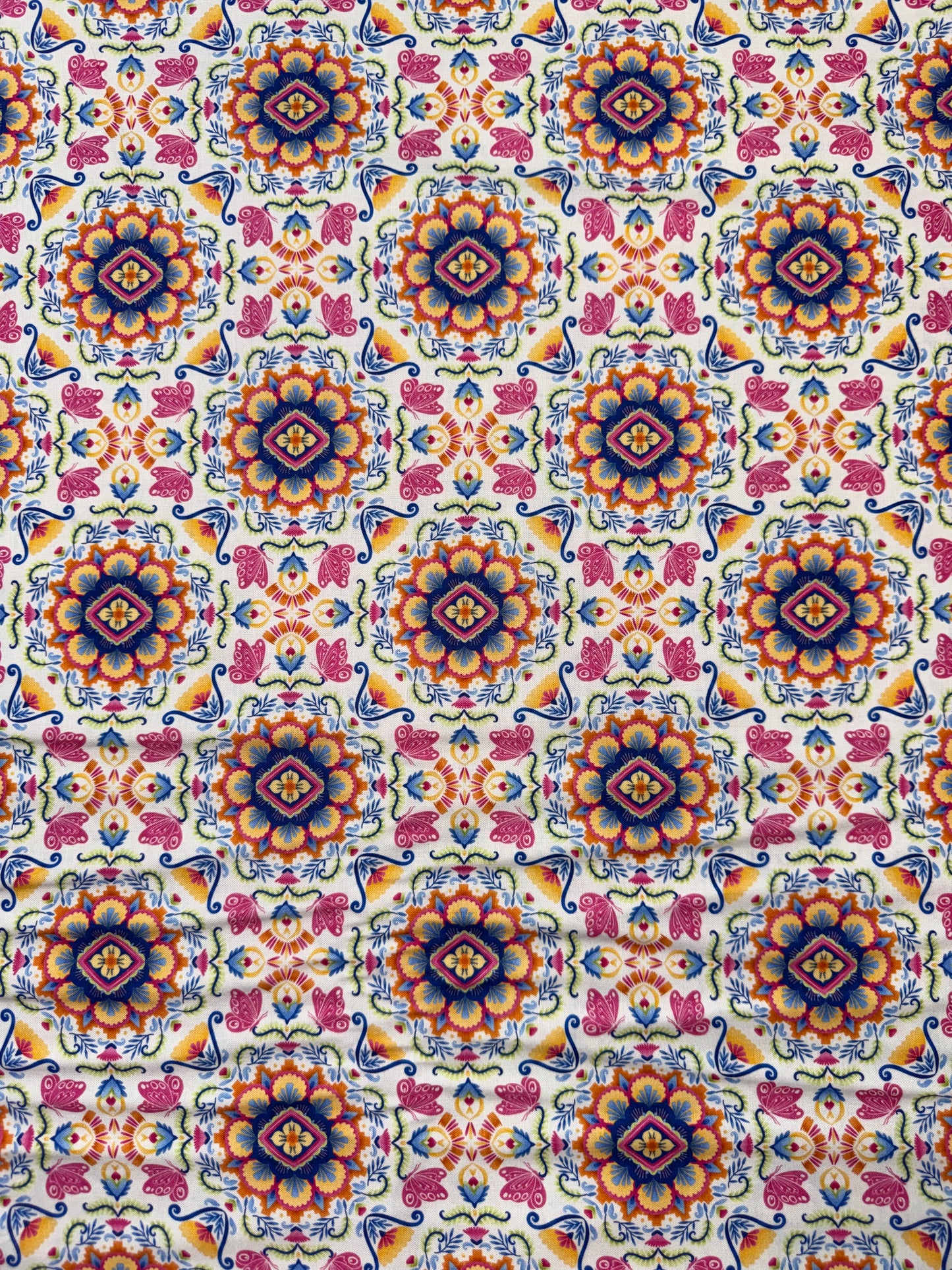 Flutter -Stylised Butterfly Medallions in orange, pink and cream