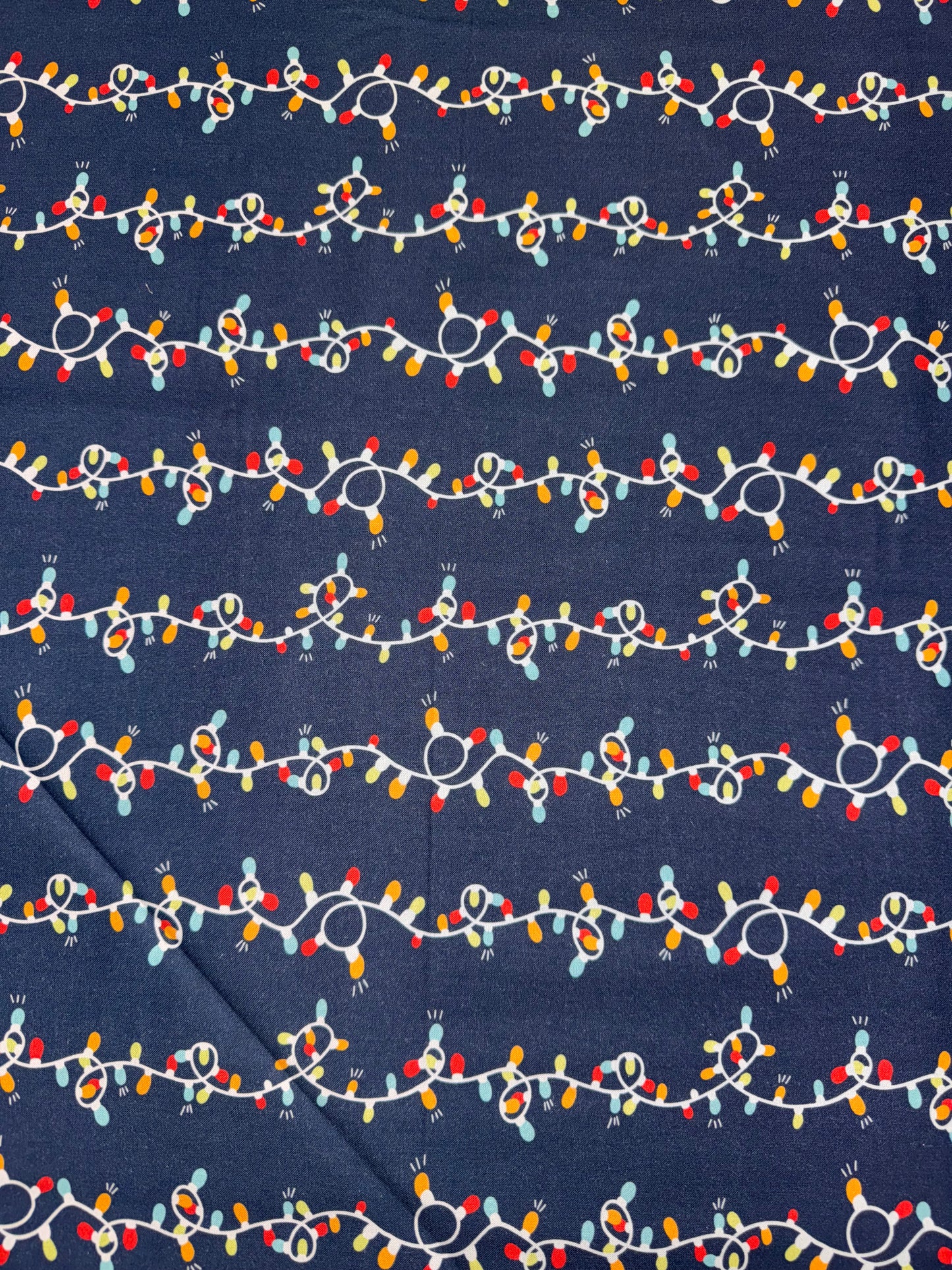 DV6268 Christmas Lights on Blue Fabric