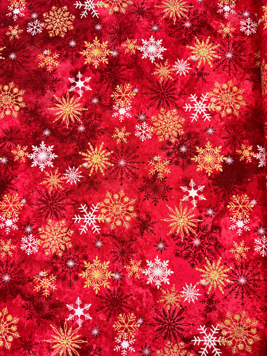 Gold and Silver Christmas Snowflakes on Red Background
