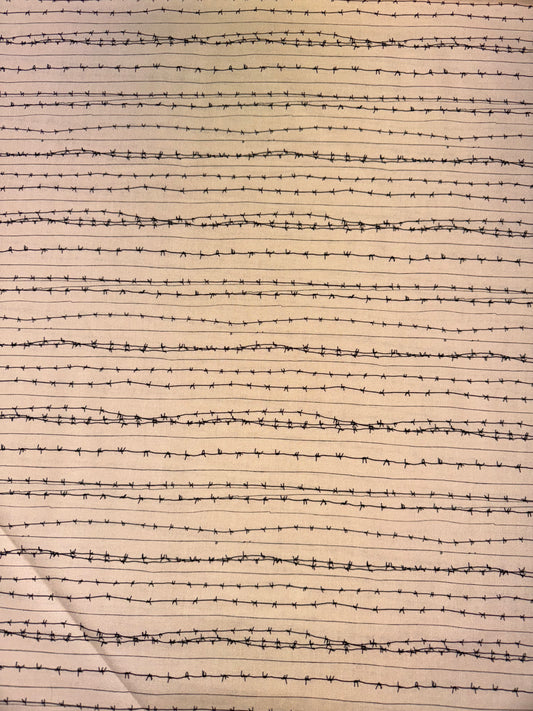 Barbed Wire on cream background