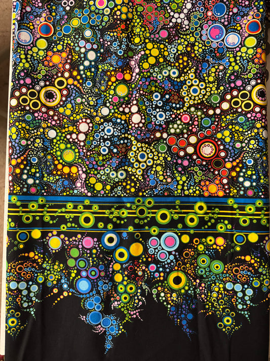 Robert Kaufman - Effervescence Border Print - Blues, Greens and Yellow on Black.